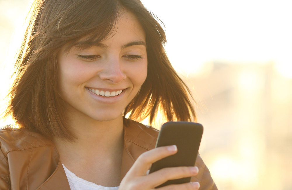 Person looking at her mobile phone