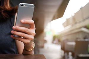 A woman with a mobile phone