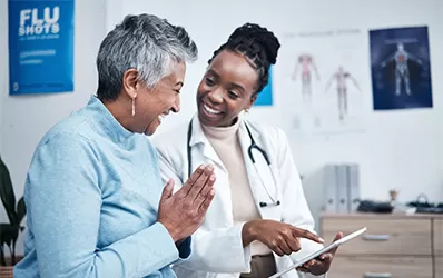 Happy patient with her physician